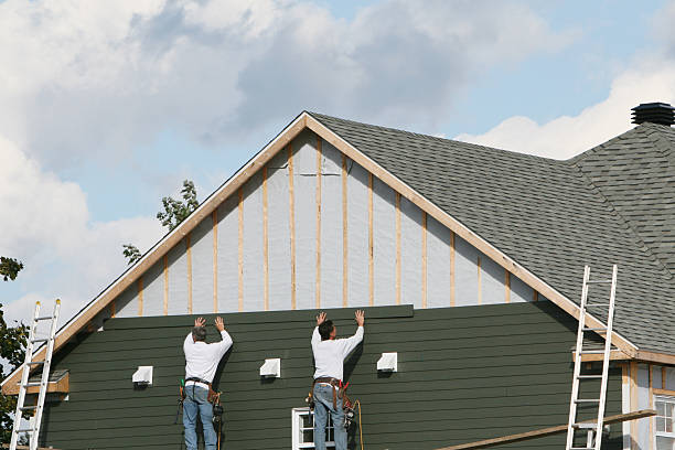 Professional Storm Damage Siding Repair technician working in Antioch, IL